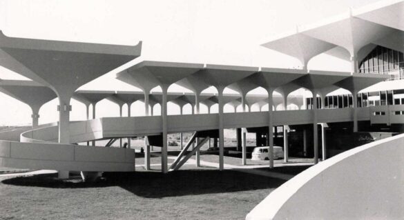 The manufactured columns continued beyond the terminal as shading and structure of the spiral carousel for transferring luggage between tarmac and lower level service floor, ca. 1971. Courtesy of Catherine, Fiona, and Jackie Page.