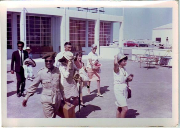 The Duff family returns to Dubai. The 1960 airport terminal in background. Photo courtesy of Diana Barnardiston.